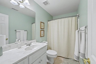 This stunning custom-built brick home in the prestigious gated - photo 31