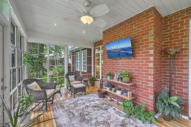 This stunning custom-built brick home in the prestigious gated - photo 36