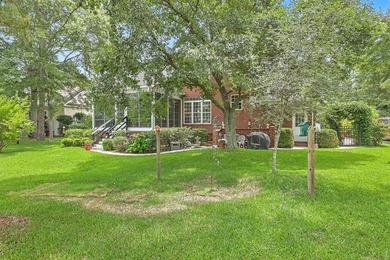 This stunning custom-built brick home in the prestigious gated - photo 39