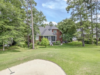 This stunning custom-built brick home in the prestigious gated - photo 48