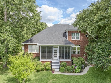This stunning custom-built brick home in the prestigious gated - photo 49