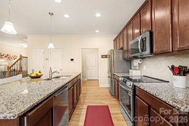 Welcome to one of the most desirable townhomes in charming - photo 9