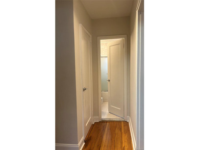 Renovated, sleek, end-of-row apartment with private entrance - photo 10