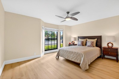 STUNNING LAKESIDE RENOVATION! 1st-floor condo offers expansive - photo 11