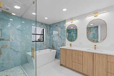 Welcome to refined living in this impeccably upgraded 3-bedroom - photo 17