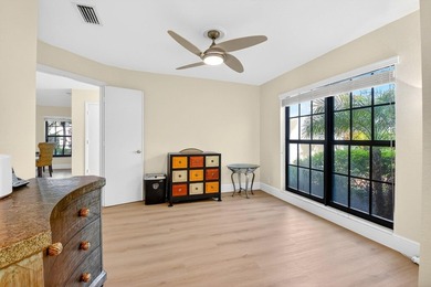 STUNNING LAKESIDE RENOVATION! 1st-floor condo offers expansive - photo 17