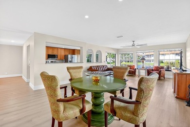 STUNNING LAKESIDE RENOVATION! 1st-floor condo offers expansive - photo 18