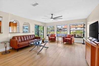 STUNNING LAKESIDE RENOVATION! 1st-floor condo offers expansive - photo 19
