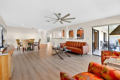 STUNNING LAKESIDE RENOVATION! 1st-floor condo offers expansive - photo 21