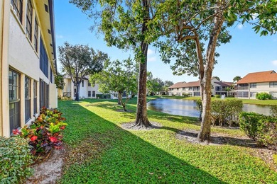 STUNNING LAKESIDE RENOVATION! 1st-floor condo offers expansive - photo 22