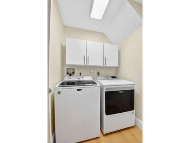 STUNNING LAKESIDE RENOVATION! 1st-floor condo offers expansive - photo 23