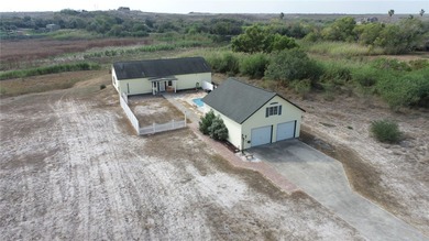 Lake Home For Sale in Sandia, Texas