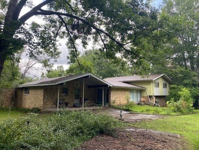 This brick home with 5 bedrooms and 3.5 baths with a double - photo 2