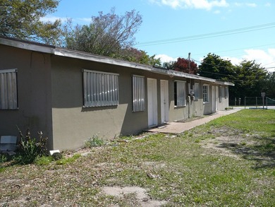 HUGE CBS DUPLEX ZONED GENERAL COMMERCIAL WHICH IS A LEGAL NON - photo 3