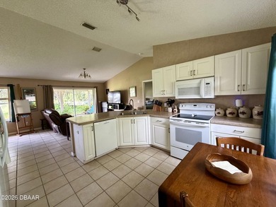 This three-bedroom, two-bathroom, waterfront home in the Waters - photo 11