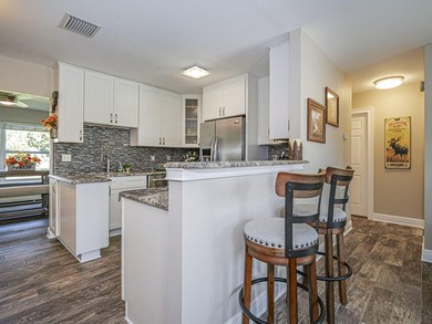 Now this is the total package! Waterfront + renovated 2/2 + - photo 11