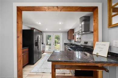 Discover this absolutely charming three-bedroom, two-bathroom - photo 14