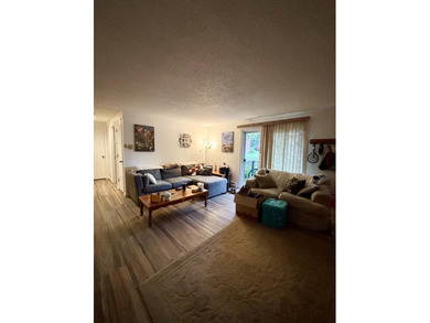 Enjoy the ease of low-maintenance living in the desirable - photo 5