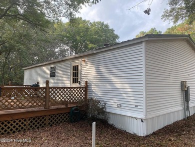 Spacious home with a metal roof, quiet neighborhood, carport and - photo 2