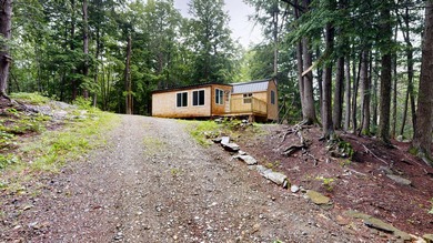 Escape to the shores of beautiful Cobbossee Lake with this - photo 1