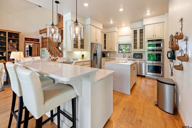 Gorgeous two-story lake home with both cove views and huge main - photo 17