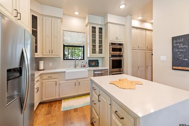Gorgeous two-story lake home with both cove views and huge main - photo 19