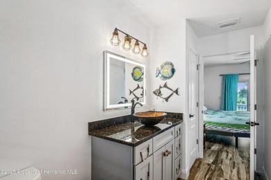 This elevated 2022 Gulfstream Homes custom build delivers modern - photo 25