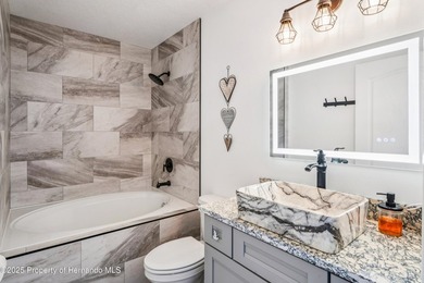 This elevated 2022 Gulfstream Homes custom build delivers modern - photo 29
