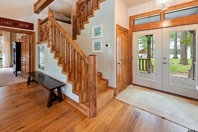 Gorgeous two-story lake home with both cove views and huge main - photo 38