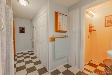 Peaceful lakefront living awaits. Tucked inside a protected - photo 23