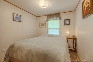 Peaceful lakefront living awaits. Tucked inside a protected - photo 33
