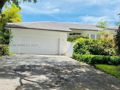 This beautiful house sits on an elevated lot in prestigious - photo 2