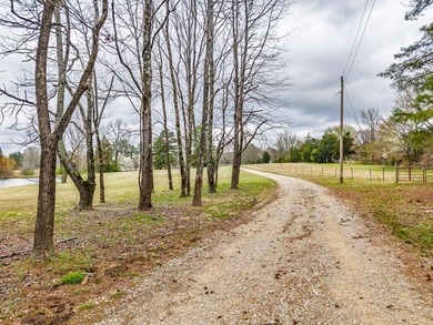 Experience peaceful country living on 25 beautiful acres in the - photo 20