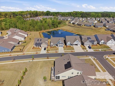 This meticulously maintained 3-bedroom, 2.5-bath residence with - photo 2