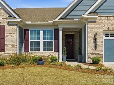 This meticulously maintained 3-bedroom, 2.5-bath residence with - photo 3