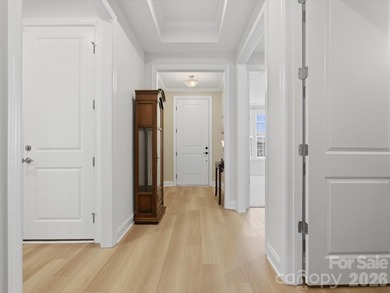 This meticulously maintained 3-bedroom, 2.5-bath residence with - photo 4