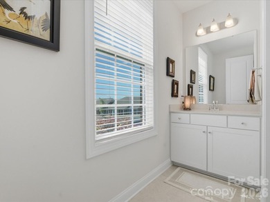 This meticulously maintained 3-bedroom, 2.5-bath residence with - photo 6