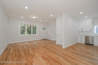 NEW CONSTRUCTION! Beautiful TWO family custom 6 over 6 home - photo 13