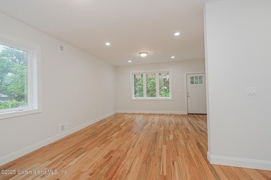 NEW CONSTRUCTION! Beautiful TWO family custom 6 over 6 home - photo 14