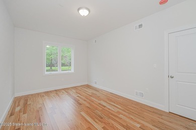 NEW CONSTRUCTION! Beautiful TWO family custom 6 over 6 home - photo 21