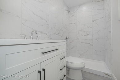 NEW CONSTRUCTION! Beautiful TWO family custom 6 over 6 home - photo 23
