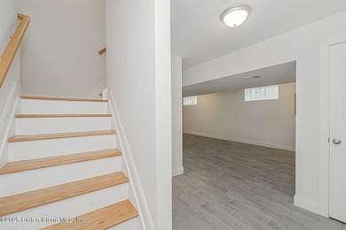 NEW CONSTRUCTION! Beautiful TWO family custom 6 over 6 home - photo 29