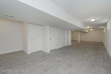 NEW CONSTRUCTION! Beautiful TWO family custom 6 over 6 home - photo 31