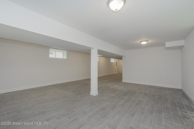 NEW CONSTRUCTION! Beautiful TWO family custom 6 over 6 home - photo 34