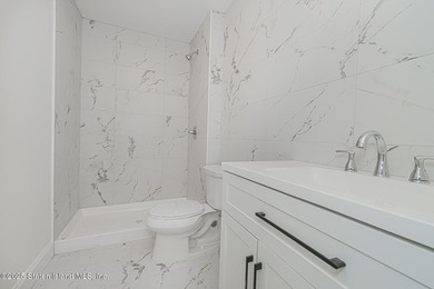 NEW CONSTRUCTION! Beautiful TWO family custom 6 over 6 home - photo 35
