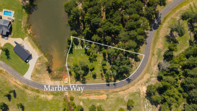 Tucked along the banks of Big Rock Lake, Lot 37 offers a rare - photo 4