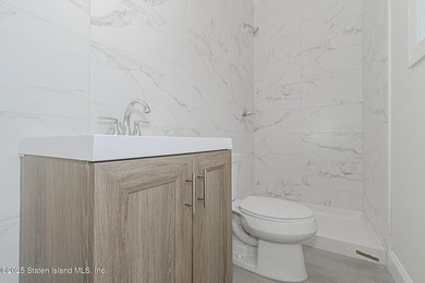 NEW CONSTRUCTION! Beautiful TWO family custom 6 over 6 home - photo 44