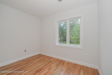 NEW CONSTRUCTION! Beautiful TWO family custom 6 over 6 home - photo 47