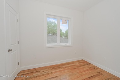 NEW CONSTRUCTION! Beautiful TWO family custom 6 over 6 home - photo 48