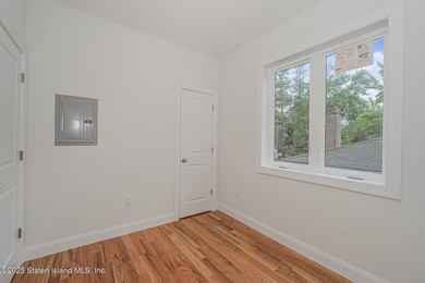 NEW CONSTRUCTION! Beautiful TWO family custom 6 over 6 home - photo 49